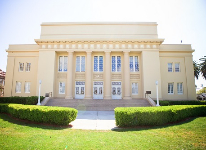 Building with columns and sunshine