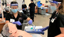 Student working on a dummy