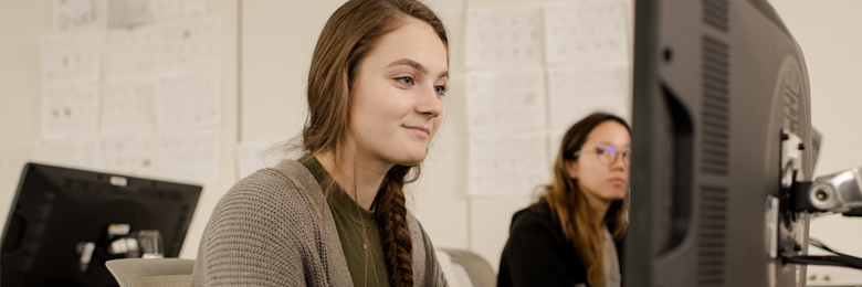 Chapman student at computer 