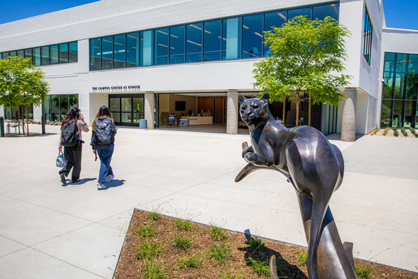 Panther statue in front of Rinker campus building