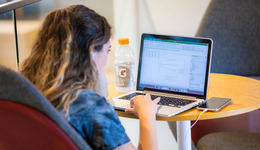 Student checking her computer