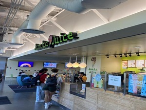 The Chapman University Jamba Juice location. Two students are at the counter.