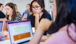 Chapman student studing in a classroom