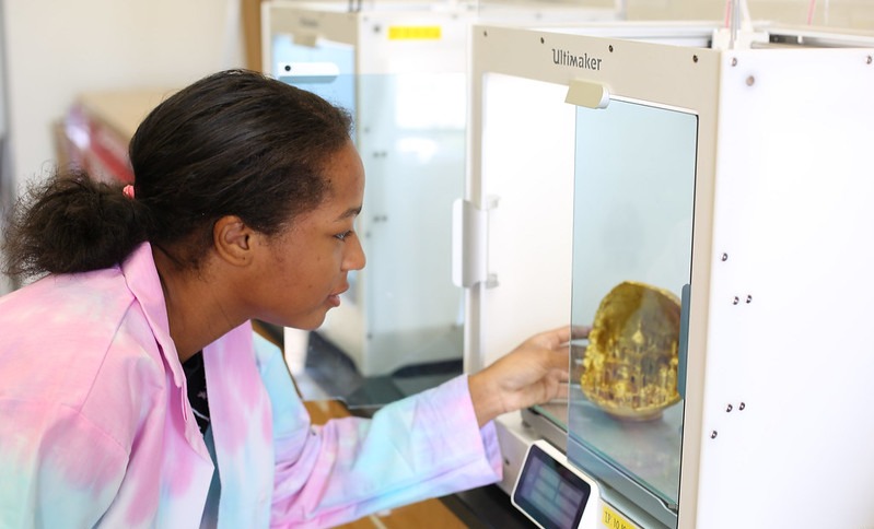 student using a 3D printer