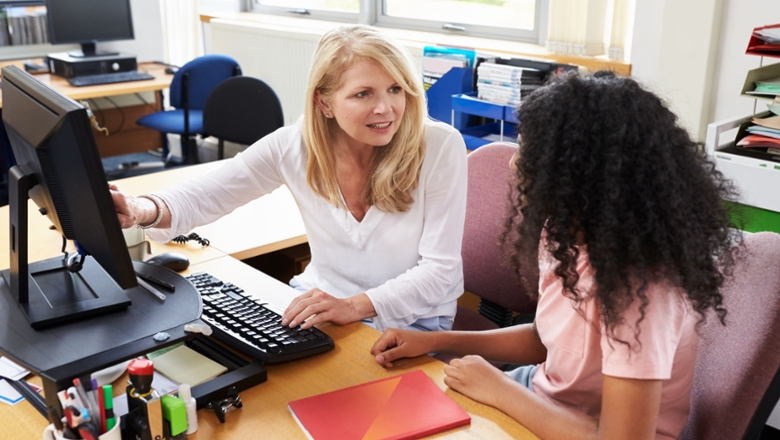 A college counselor talking to a student