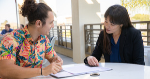 academic advisor talking to student