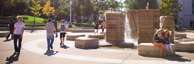 Chapman University students walking through Attallah Piazza 