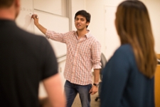 student at whiteboard