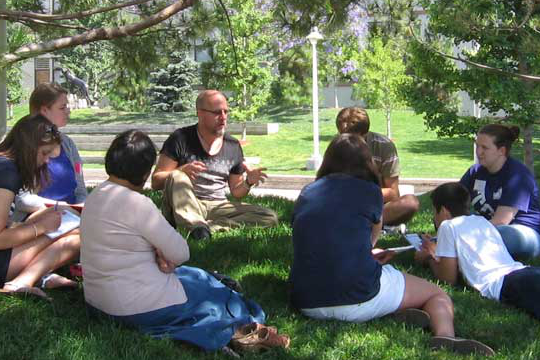 People gathered in grass