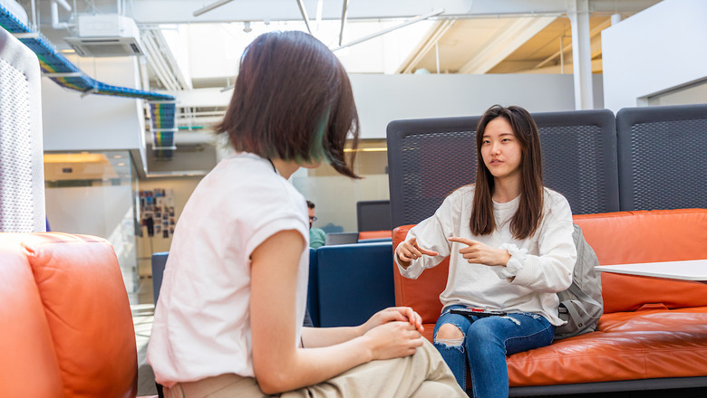 Two students having a discussion.