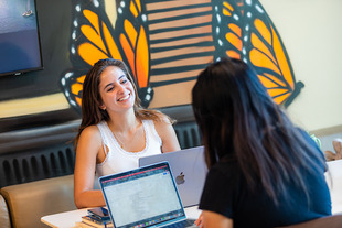 students talking in career center