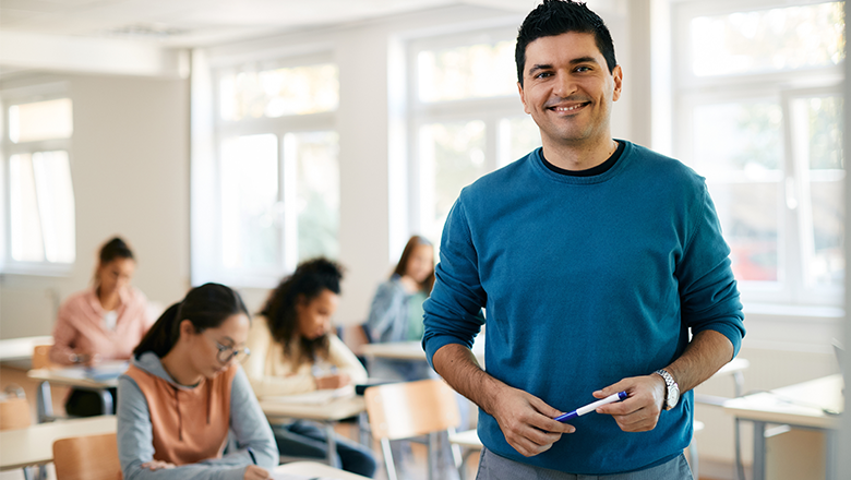 Chapman student teacher helping student