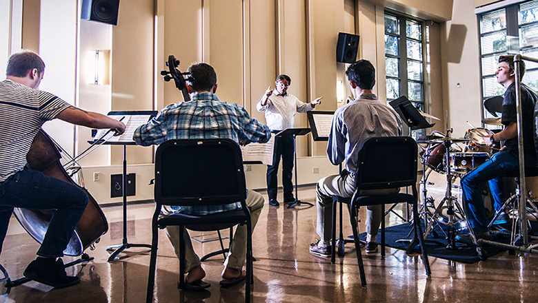 Students playing musical instruments