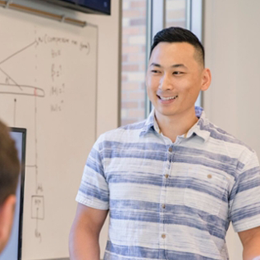 A student at a whiteboard.