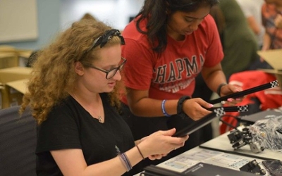 Chapman students putting together a 3D printer