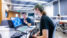 Two students working on a project