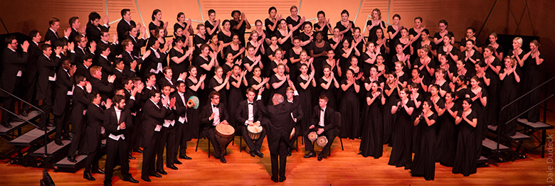 group of singers on stage at the annual wassail concert at chapman university