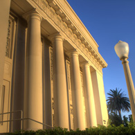 Sun reflecting off Chapman's Memorial Hall columns at dusk.