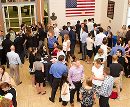 people talking in building lobby