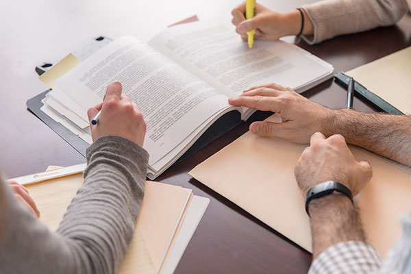 Hands and paperwork