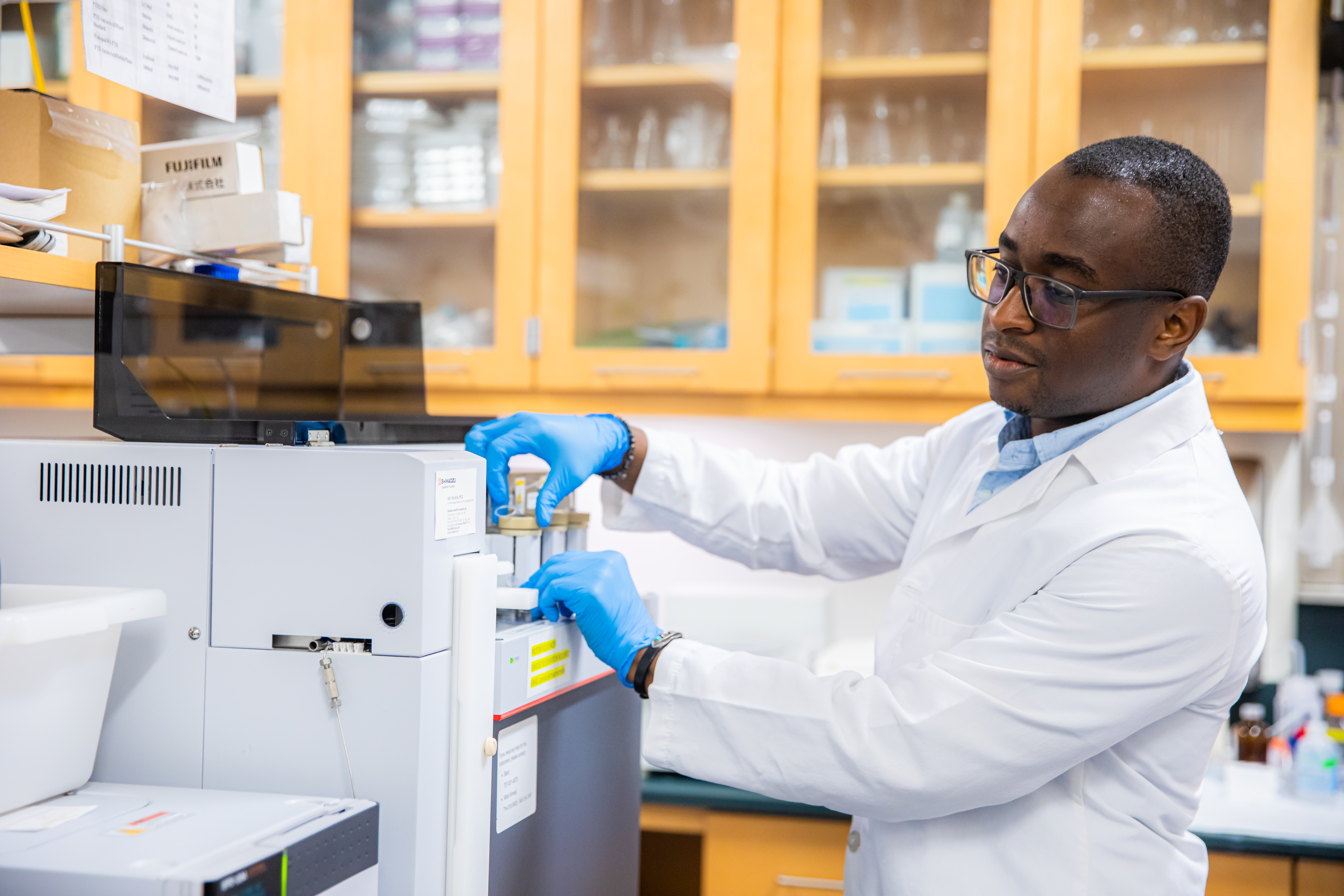 PhD students with equipment