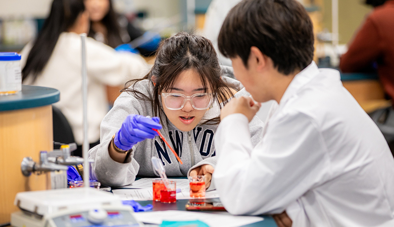 two students working in a lab