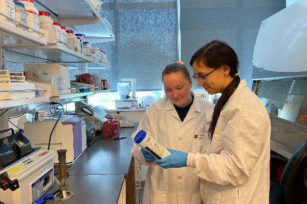 two students in lab