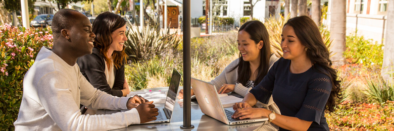 Graduate students in Argyros Forum at Chapman University