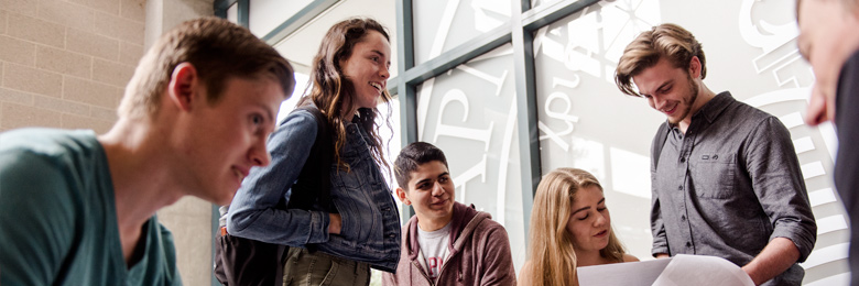 Graduate students in Argyros Forum at Chapman University