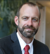 Headshot of Schmid College Dean Andrew Lyon