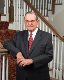 man standing by a staircase