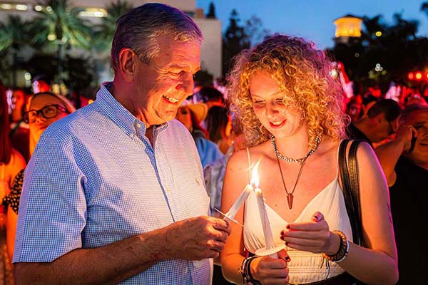 Parent and student at candle lighting