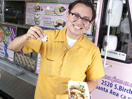 person in front of food truck 