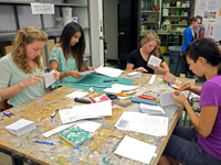 students working on sculptures