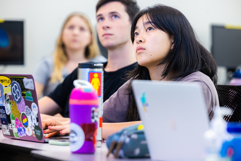 Wilkinson College students listening intently to lecturer